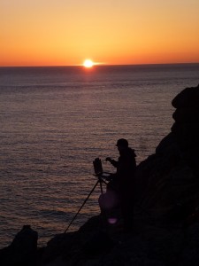 Roy Connelly painting at sunset near Lands End